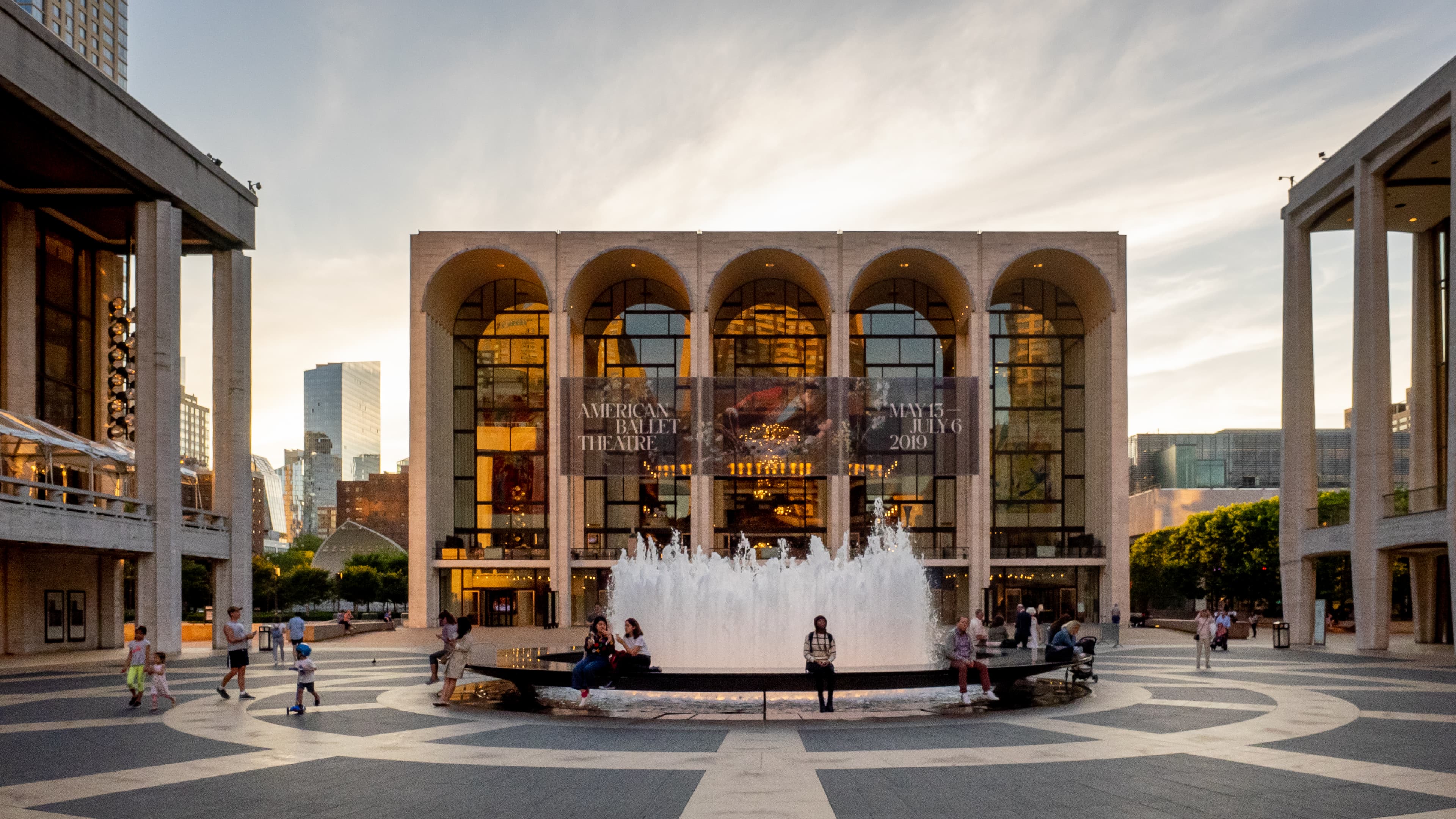 Lincoln Center plaza at twilight, four blocks south of 117 West 70th Street
